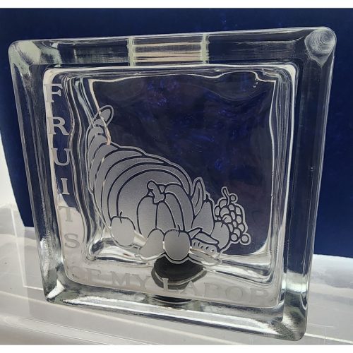 Glass money bank etched “Fruit of My Labor”