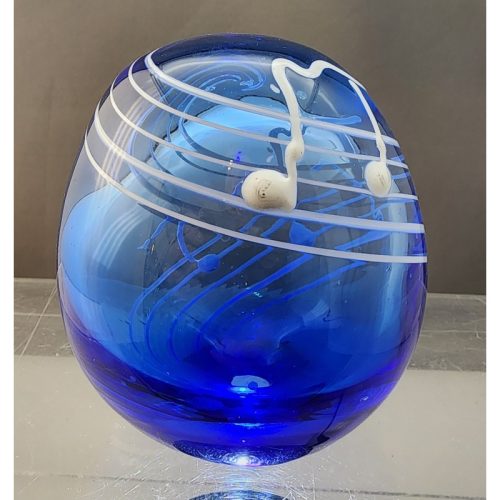 Musical Art glass blue paperweight hollow